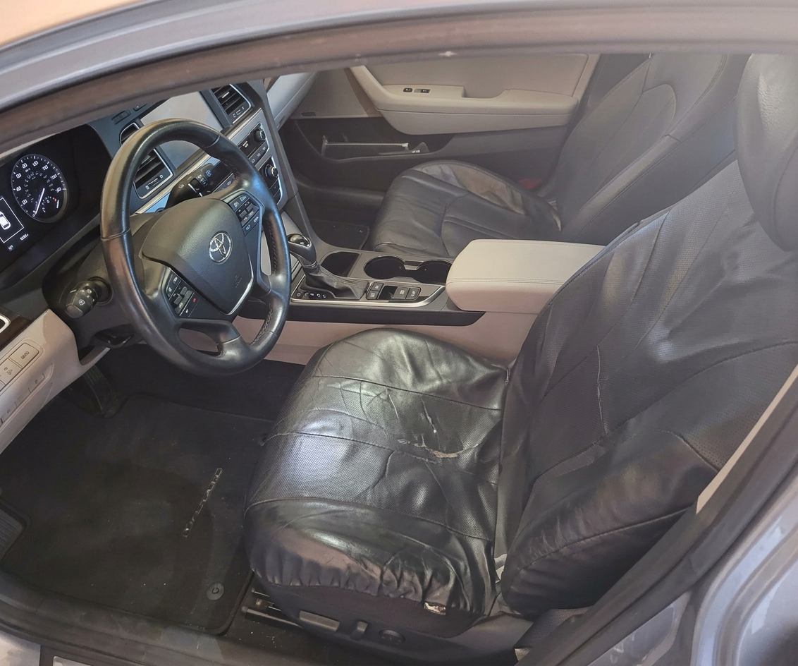 Front seats covered for interior protection during detail