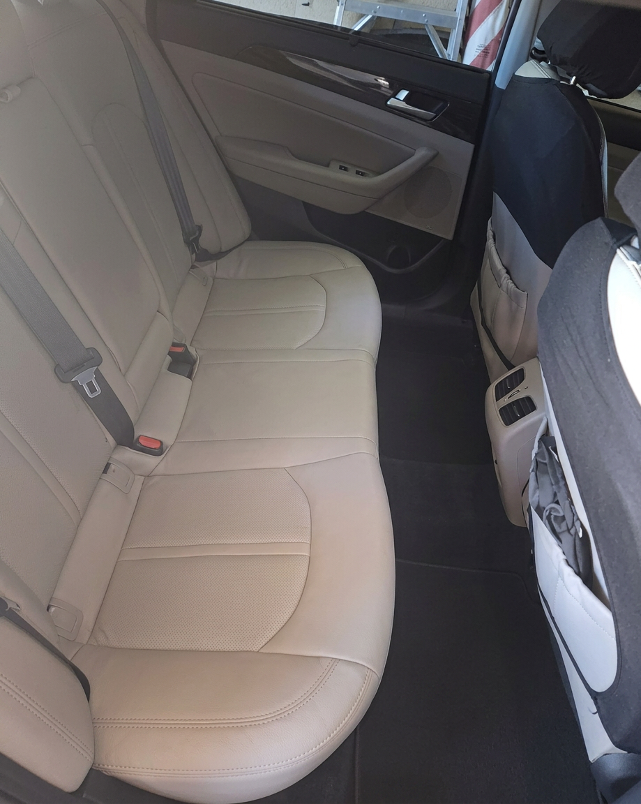 Clean tan leather rear seats after interior detail